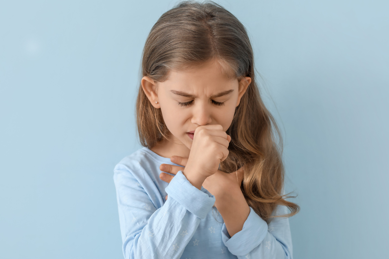 Portrait of a Sick Young Girl Coughing